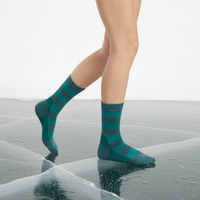 Chaussettes d'hiver chaudes en laine mérinos/nylon, épaisses, à motif, antidérapantes, respirantes, avec logo personnalisé sur le bord, pour femmes, OEM, usage quotidien
