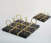 Base en marbre noir de qualité supérieure Tic tac Toe Game Sculpture pour la décoration intérieure et la décoration de table Utilisez un design abstrait avec plaqué or