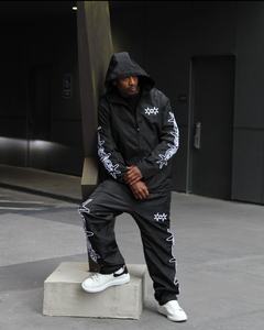 Chaqueta bordada de verano de alta calidad para hombre, chaqueta de concha suave personalizada, pantalones, chándal, conjunto corto cortavientos de bloque de Color para hombre - Product Image 2