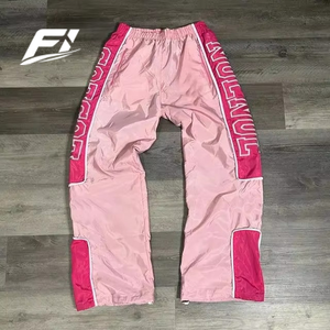 Pantalones cortavientos personalizados al por mayor para hombre, informales, con bordado desgastado, tallas grandes, estilo urbano, ligeros, de poliéster, fabricados en EE. UU. - Product Image 4