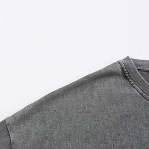 เสื้อยืดคอกลมแขนสั้นสีดำล้วนสำหรับผู้ชายเสื้อยืดทรงหลวมลำลองสีพื้น - Product Image 4