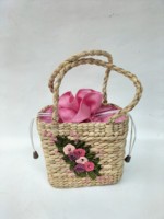 Mewah modis desain trendi Handwoven air ramah lingkungan Hyacinth Satchel Vietnam buatan tangan dua bunga penutupan Lace-Up 1L