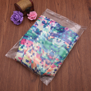 Bolsas OPP Autoadhesivas de BOPP para Empaque de Ropa, Bolsas de Plástico Transparentes con Etiqueta de Advertencia, Cierre de Botón Resistente, Impresión Offset - Product Image 1
