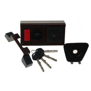 Verrouillage de jante GERDA TYTAN ZE-1 ZL certifié Classe C, 4x clés avec éléments de fixation (pour portes gauches ouvertes de l'extérieur), marron - Product Image 1