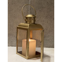 Ensemble fait main de vente chaude de 3 lanternes décoratives de différentes tailles de bougeoirs en or avec finition brillante du fabricant indien