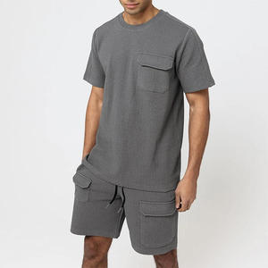 Conjunto de ropa informal para hombre Pantalones cortos de algodón de secado rápido y camiseta de manga corta Chándal sólido LOGOTIPO personalizado 2 piezas Colección de marca - Product Image 1