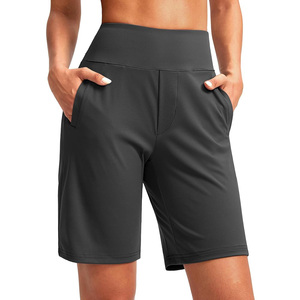 Pantalones cortos de Yoga de cintura alta para mujer con logotipo personalizado Cómodo elástico para gimnasio y sesiones de yoga Patrón sólido - Product Image 1
