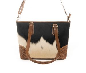 กระเป๋าถือโบฮีเมียนมือใหม่หนังวัวแท้วินเทจดีไซน์พรีเมี่ยมแฮนด์เมดสไตล์ตะวันตกทำด้วยมือผ้าใบ - Product Image 1