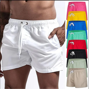 Venta al por mayor de pantalones cortos deportivos de gimnasio para hombres con cintura elástica con estampado de nailon de poliéster liso informal personalizado con bolsillo lateral para correr - Product Image 1