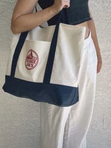 Haute qualité 100% coton moyen sac fourre-tout Logo personnalisé réutilisable sac en tissu fermeture à l'épaule couleur personnalisée longueur d'épaule - Product Image 5