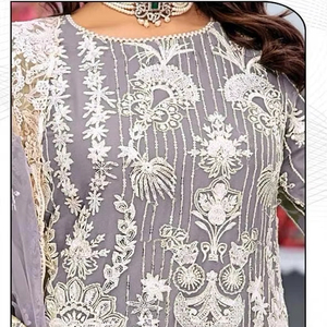 Embrassez Elegance Winter Collection Shalwar Kameez en organza brodé de perles avec filet Dupatta et Santoon Robe élégante intérieure - Product Image 1