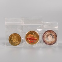 En stock : Pochette refermable en PVC transparente anti-oxydation avec trou de suspension et fermeture éclair pour l'emballage de pièces de monnaie, badges, pendentifs, breloques et bijoux