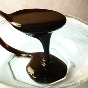 深棕色液体甘蔗黑带糖蜜用于烘焙生产乙醇动物准备出口角