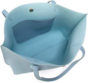 Bolso de mano contemporáneo de piel sintética para mujer, bolso de mano para mujer con líneas limpias, acento de borla y construcción espaciosa hecha en Pakistán - Product Image 4