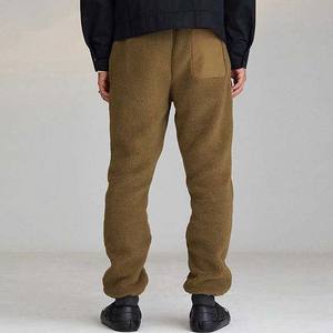 กางเกงวิ่งแบบมีซิปครึ่งขาของผู้ชายกางเกงผ้าฟลีซทรงหลวมกางเกงกีฬาสำหรับผู้ชายตรงลายทางแบบโค้งผลิตตามสั่ง - Product Image 4