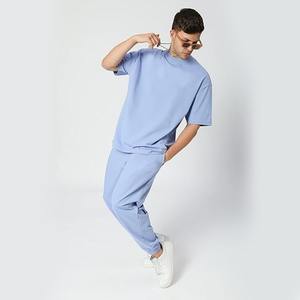 Ensemble de survêtement d'hiver pour hommes, couleur et logo personnalisés, haute qualité, respirant, décontracté, coupe ample, t-shirt, pantalon ample - Product Image 4