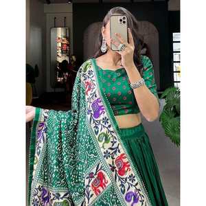 Lehenga Choli traditionnel en soie Dola à imprimé Patola vert attrayant pour les mariages - Product Image 1