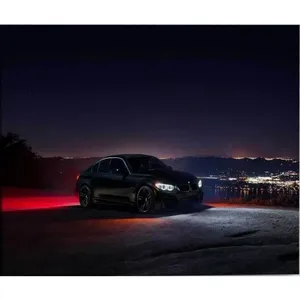 Impression sur toile Fida Black BMW M3 dans les lumières de la ville nocturne - Product Image 6