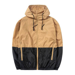 Veste coupe-vent en nylon 100% personnalisée pour hommes, survêtement imperméable avec fermeture éclair sur le devant pour l'hiver - Product Image 1