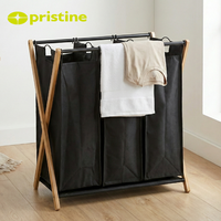 Panier à linge double pliable minimaliste avec cadre métallique en toile noire pour organiser les vêtements, à utiliser dans la cuisine ou la salle de bain