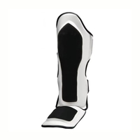 Protège-tibias en cuir élastique personnalisés avec protection professionnelle pour l'entraînement de Muay Thai et de Kick Boxing, couleurs et logo personnalisables
