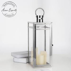 Linterna moderna de metal plateado con diseño de corte geométrico, ideal para iluminación de velas, decoración del hogar, bodas y eventos al aire libre - Product Image 3