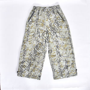 Pantalones de nieve de esquí impermeables holgados de camuflaje de invierno con cintura elástica bolsillos laterales con cremallera ajustable Cuff Bottoms - Product Image 1