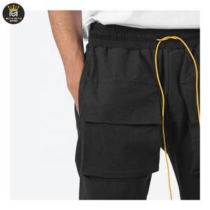 กางเกงคาร์โก้ผู้ชายทรงสตรีทแวร์ ดีไซน์ใหม่ล่าสุดปี 2025 ระบายอากาศได้ดี มีเชือกผูกและกระดุม กันน้ำ เป็นมิตรกับสิ่งแวดล้อม ขายดีจากโรงงาน - Product Image 6