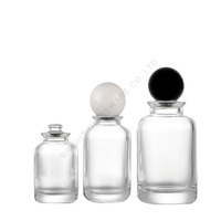 Bouteille ronde de parfum ambré de luxe avec pulvérisateur 30ml 50ml 100ml Bouteille en verre vide avec bouchon à bille pour dame
