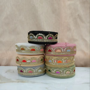 Tissu en dentelle florale brodée de sequins haut de gamme avec motifs élégants pour les mariages et les vêtements de créateurs - Product Image 1