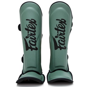 Espinilleras Premium de Muay Thai: Diseñadas con maestría para una máxima protección durante el sparring intenso y el trabajo con saco de boxeo pesado. - Product Image 1