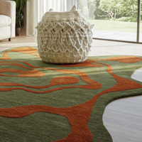 Tapis moderne personnalisé en laine tufté à la main au design abstrait forme libre en vert olive et orange brûlé lavable pour la maison ou le pique-nique