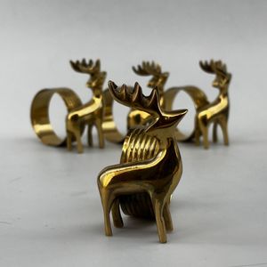 Stylish Metal Reindeer Napkin Ring Crafted For Modern Families Seeking Beautiful Festive <b>Table</b> Presentation Ideas - Product Image 1