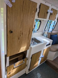 Caravane Scamp 16' pour 4 personnes, salle de bain sèche, joints de fenêtre neufs, pneus neufs, alimentation intégrée et espace de préparation pour la garantie - Product Image 3