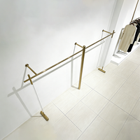 Porte-vêtements sur pied simple en tuyau industriel moderne, combinaison de présentoir mural pour magasin de vêtements