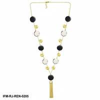 Collier tendance moderne noir et blanc avec pendentif gland doré, long bijou géométrique en résine et laiton pour femme, idéal pour les soirées