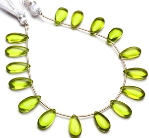 Coszcalt Exports Peridot Hydro Gemstone Green Color Glass Quartz 15x7mm Smooth Pear Shape Beads Third Party Appraised for - Product Image 1