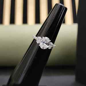 Luxury Three Stone Elegant Oval Cut Moissanite Engagement Ring with Stainless Steel Unique Design for <b>Your</b> <b>Loved</b> One - Product Image 1