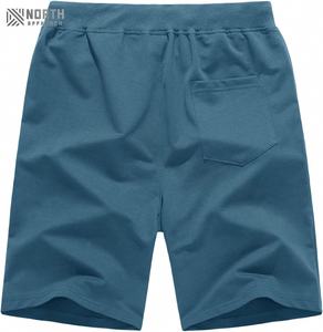 กางเกงขาสั้นผ้าฝ้าย100% สำหรับผู้ชายกางเกงขาสั้นเอวเชือกผูกแบบลำลองระบายอากาศได้ดีสีพื้นใหม่ & ย้อมสีล้วนสำหรับฤดูร้อน - Product Image 2