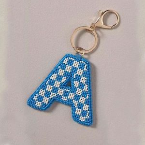 พวงกุญแจลูกปัดพร้อมคาราไบเนอร์สำหรับใช้ส่วนตัวและยานพาหนะ - Product Image 1