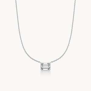 Collier en diamant serti d'émeraudes - Product Image 1