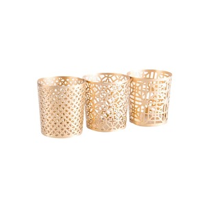 Porte-bougie rond en métal élégant, conçu pour l'esthétique de la maison, avec des bords lisses et un effet lumineux chaleureux - Product Image 4