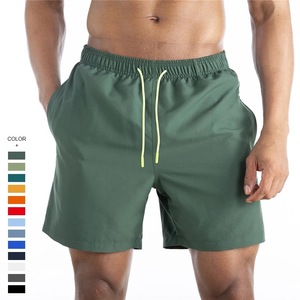 Venta al por mayor de fábrica Bikinis y ropa de playa de diseño personalizado de los hombres de gimnasio Floral Boot Shorts con estilo con cuello en V de cuadros de impresión de punto Venta caliente - Product Image 1