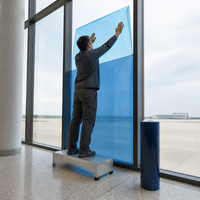 Film de protection de surface PE bleu anti-rayures pour murs-rideaux en verre, respectueux de l'environnement, personnalisable pour le transport de verre