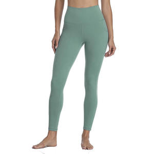 Mallas ajustadas de compresión de longitud completa para mujer de cintura alta Material transpirable duradero con bolsillos Pantalones sin costuras de color sólido - Product Image 3