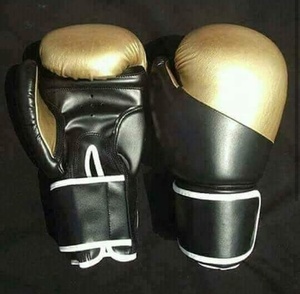 ถุงมือมวยหนัง PU สีดำสีแดงใหม่สำหรับผู้ใหญ่โลโก้ OEM ขนาด6ออนซ์12ออนซ์การฝึกศิลปะการต่อสู้มีต้นกำเนิดจากไทย - Product Image 4