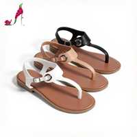 Sandales plates pour femmes en similicuir, style minimaliste, avec anneau métallique et bride en T, boucle de cheville réglable, pour les sorties bohèmes et les soirées romantiques, chaussures d'été