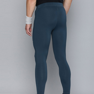 Calzoncillos largos ligeros transpirables para hombre con tela térmica de lana merino 200GSM pantalones de capa base OEM hechos a medida para ropa de invierno - Product Image 6