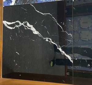 Nuestros azulejos de porcelana de alto brillo de 600x600, fabricados con orgullo en la India, ofrecen una elegancia y durabilidad incomparables con calidad de grado AAA - Product Image 1