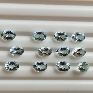 Piedra de Aguamarina azul personalizada del fabricante 5X7mm Corte ovalado natural Piedra preciosa facetada Joyería azul Productor de piedras preciosas sueltas - Product Image 1